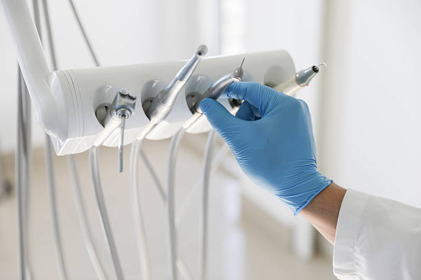 Professional Teeth Cleaning And Checkup technician working in East Massapequa, NY